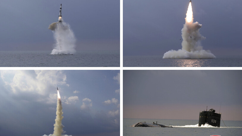Diese Kombination von vier Fotos, die von der nordkoreanischen Regierung zur Verfügung gestellt wurden, zeigt eine ballistische Rakete, die in Nordkorea von einem U-Boot aus gestartet wurde. Foto: ---/KCNA via KNS via AP /dpa - ACHTUNG: Nur zur…