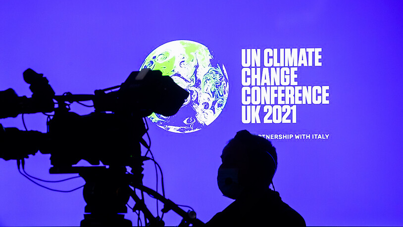 Rund 200 Staaten verhandeln darüber, wie die globale Klimakrise und die Erderwärmung eingedämmt werden sollen. Foto: Christoph Soeder/dpa