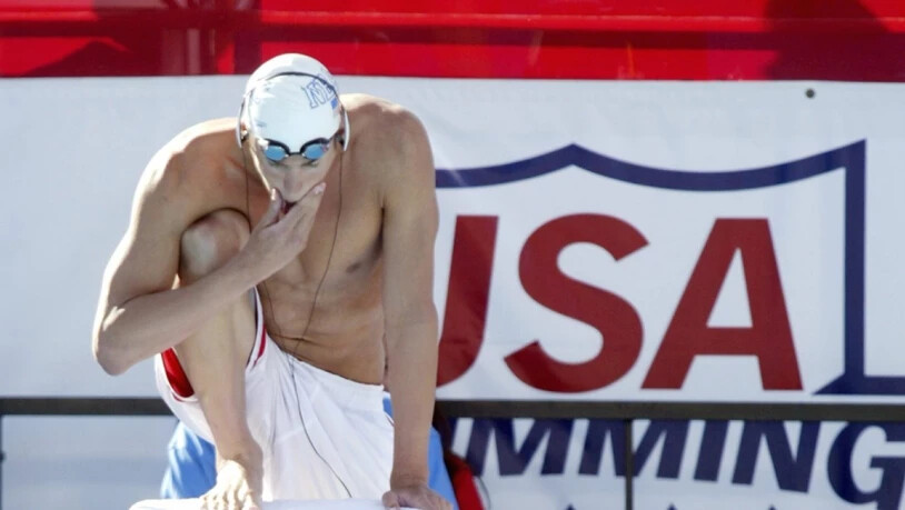 Wann immer Phelps das Aquatic Center in Athen betrat, tat er dies unter schweren Kopfhörern, mit Eminems Stimme im Ohr