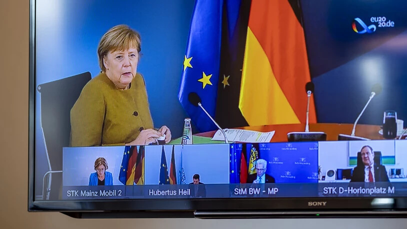 Angela Merkel (CDU), Bundeskanzlerin, spricht bei Beratungen der deutschen Ministerpräsidenten in einer Videokonferenz. Foto: Axel Heimken/dpa