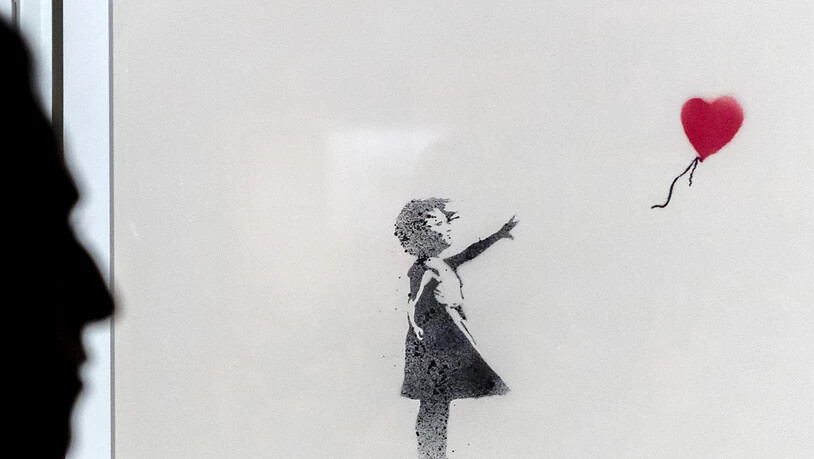 Das Werk "Girl with Balloon" von Banksy, hier auf einem Siebdruck in der Basler Ausstellung "Banksy - Building Castles in the Sky", wurde zu einer Ikone der Street-Art.