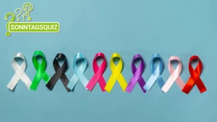 Bänder der Solidarität: Testet euer Wissen über Krebserkrankungen in unserem Quiz.